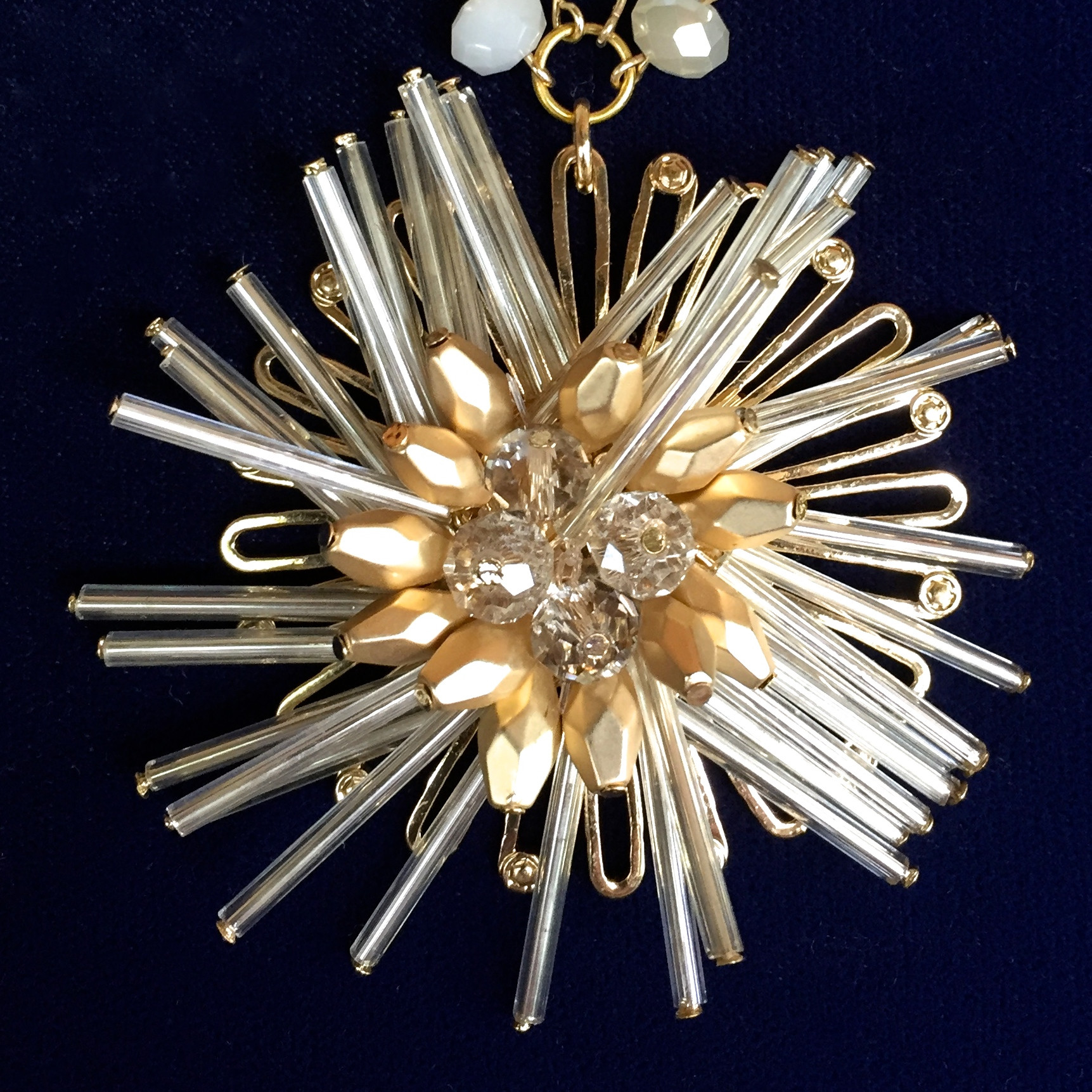 Atomic style brooch