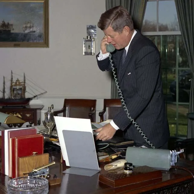 John F. Kennedy on telephone in Oval Office