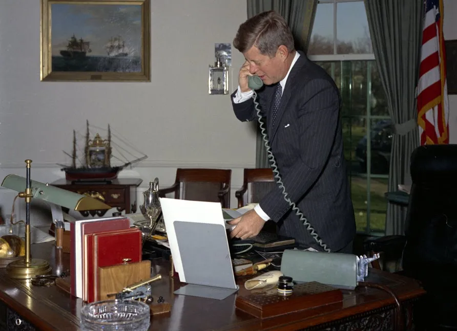 President John F. Kennedy on the telephone in Oval Office